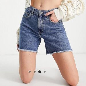 Mid-high rise jean shorts, medium wash